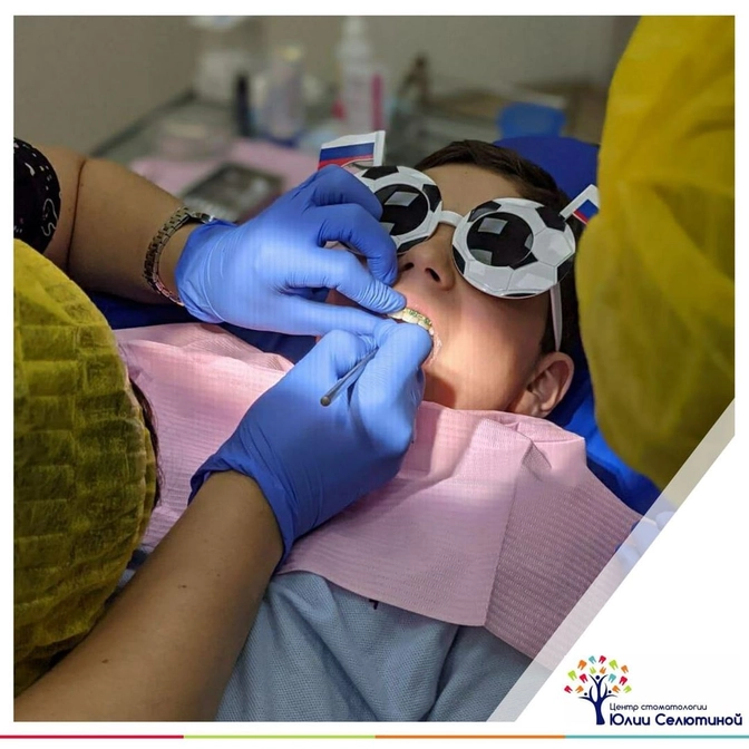 Как лечить зубы, если установлены брекеты? 